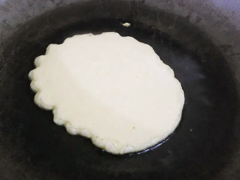 Once the pan starts smoking, place about a quarter of the batter and let it spread, just like when making pancakes for breakfast.