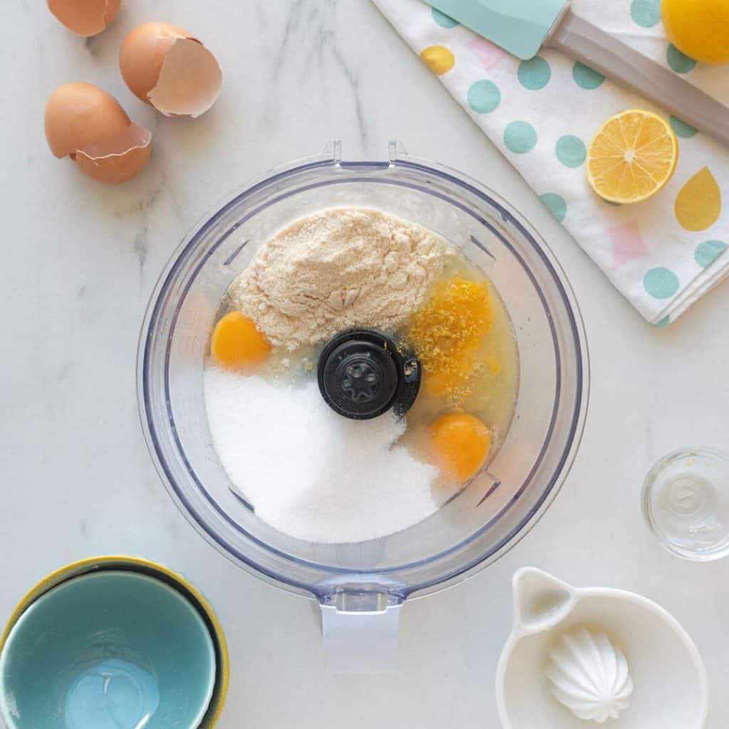 How-to-make-low-carb-keto-lemon-bar
Add eggs, lemon juice, 1 T. lemon zest, ¾ cup monk fruit sweetener, and coconut flour to blender container.